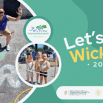 Promotional graphic for Let's Play Wicklow 2026. On the left, an outdoor event photo shows an instructor crouching over large chalk drawings on the pavement, and a circular inset photo shows three young children smiling outdoors. The right side features a green background with the text: Let's Play Wicklow 2026. Partner logos at the bottom include Wicklow Sports and Recreation Partnership, the Department of Children, Equality, Disability, Integration and Youth, Healthy Wicklow, and Wicklow County Council.